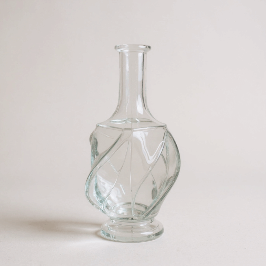 Vaso in vetro soffiato trasparente lavorazione a rilievo intrecciato attribuito alla scuola Murano