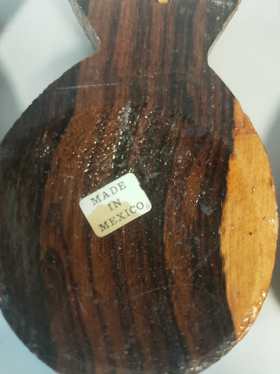 Nacchere Realizzate in Legno con Nappe Decorative di Colore Rosso e Giallo Anni '70