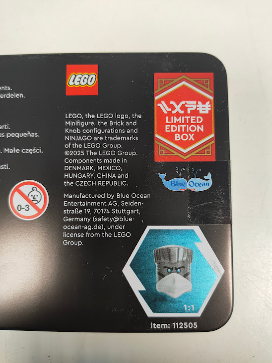Scatola di Latta LEGO Ninjago Legacy un Duello tra Zane e un Draconiano 2025